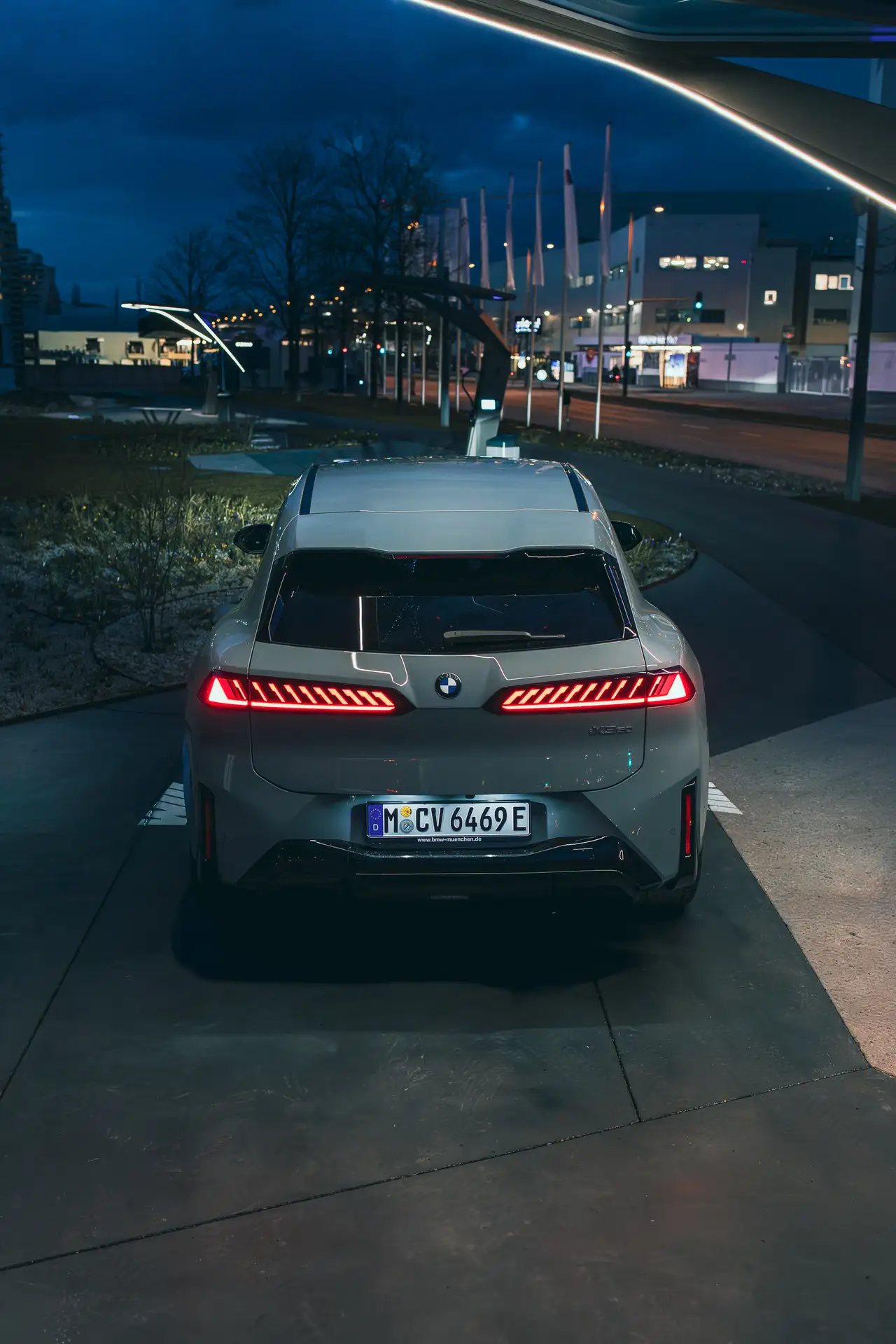Rear View of the BMW iX3 Rental Car from CarVia
